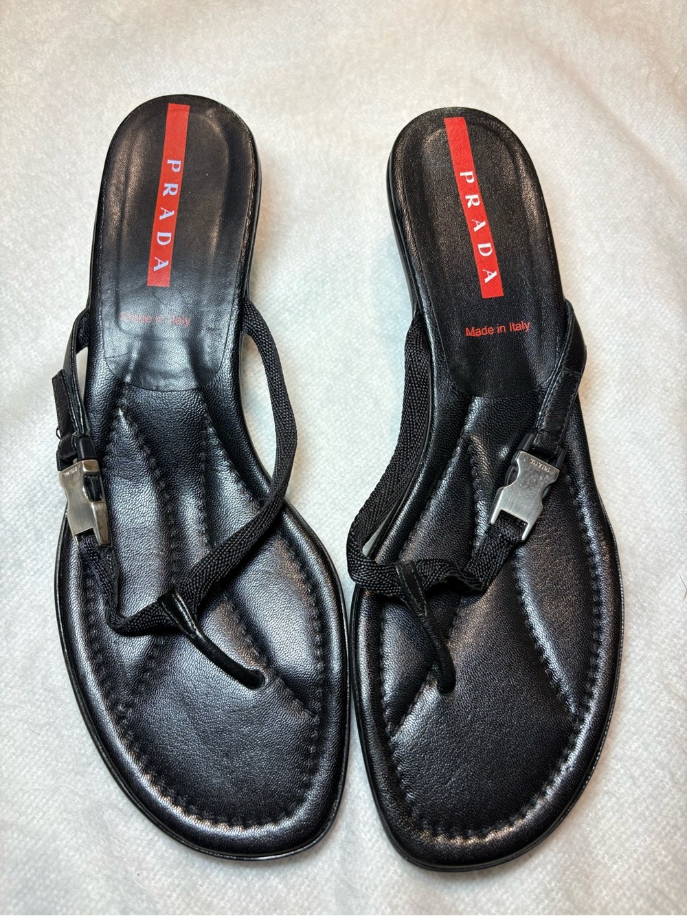 Prada Black Leather Thong with Metal Buckle Sandals with Red Logo Stripe